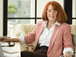 Cathrin Stickney, Parity.Org Founder & CEO, sitting at a desk