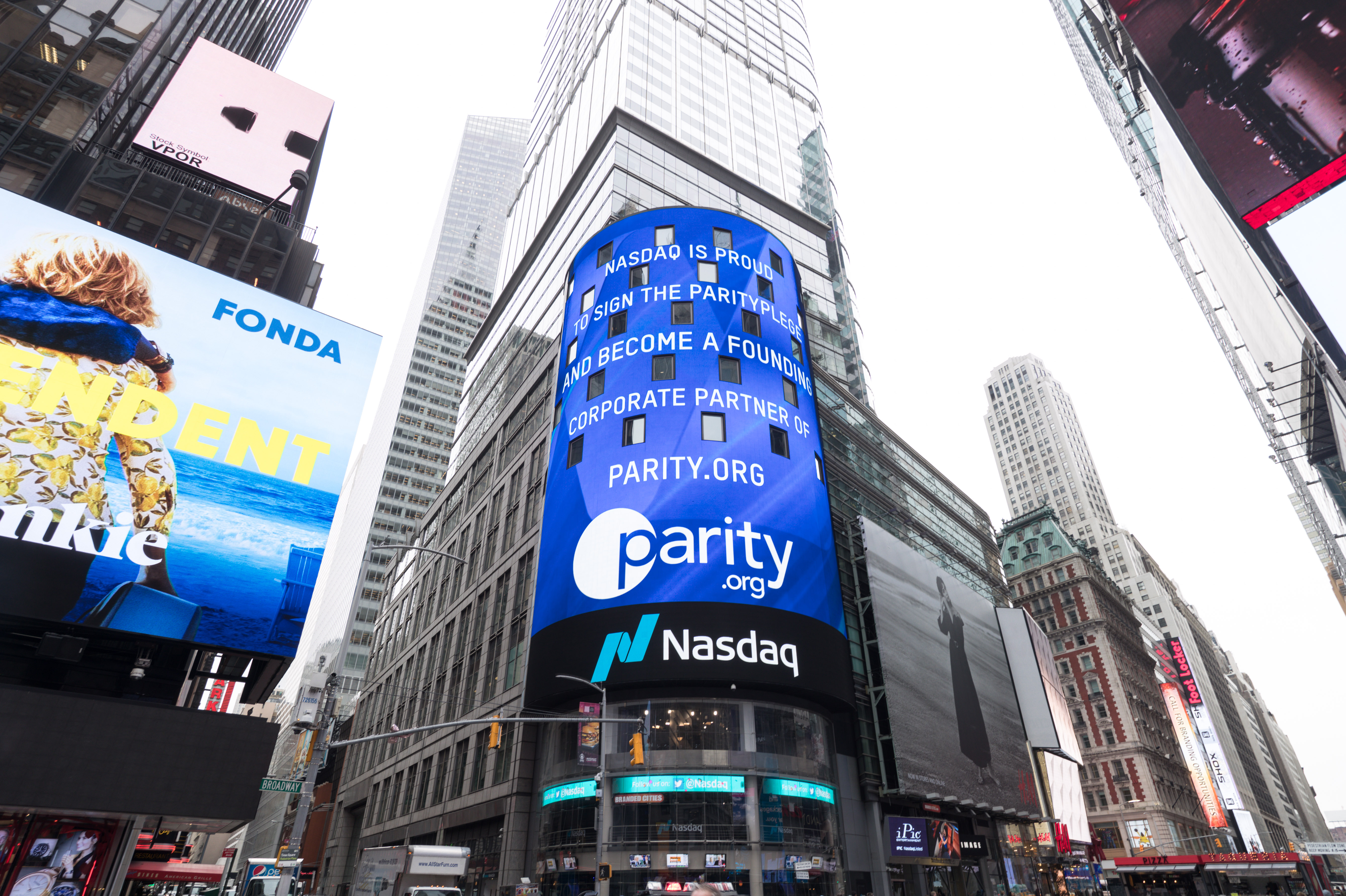 Nasdaq electronic billboard showcasing Parity.org logo