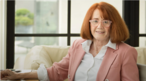 Cathrin Stickney, Parity.Org Founder & CEO, sitting at a desk